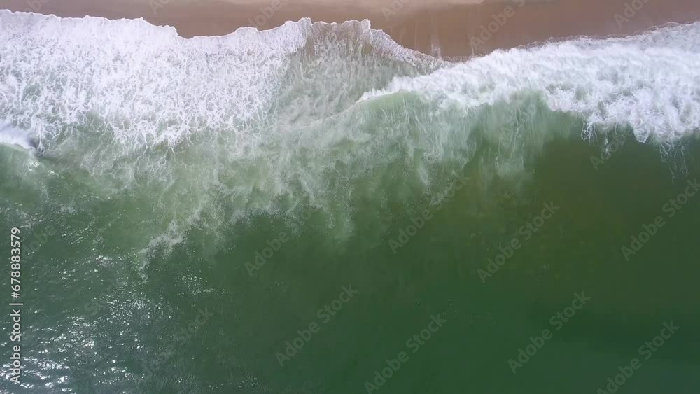 Wall mural waves break on beach aerial at the cape cod national seashore