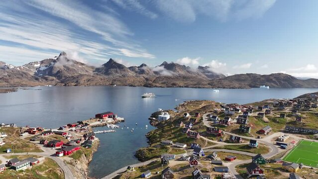 aerial view of Tasiilaq village of Greenland, cruise ship in bay