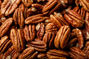 Pecan nuts background, top view