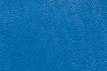 Closeup detail on blue leather texture background