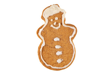Cute fresh gingerbread snowman decorated with royal icing, isolated on white background. Christmas food, pastry background. New Year theme