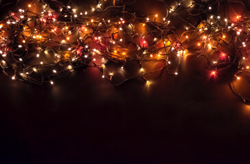 Fototapeta na wymiar Colourful Christmas lights black background