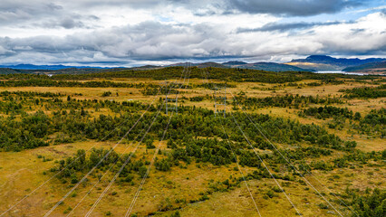Fototapeta na wymiar Power lines across the mountains