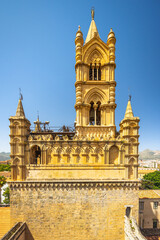 Fototapeta na wymiar Palermo Cathedral, view of tower from roof of cathedral, a major landmark and tourist attraction in capital of Sicily, Italy, Europe.