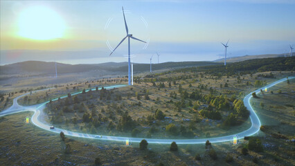 Wind turbines generating power and animation of sending electrical energy to EV's driving on roads....