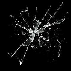 a broken glass window on a black background with some smaller pieces of broken glass scattered