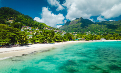 Panoramic landscape of the popular Beau Vallon Beach of Mahe island, Seychelles. Tropical beach in the Indian ocean, travel postcard