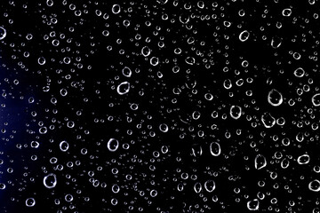 water drops on black surface, background