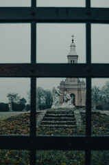 A view through the bars of the Gothic scene. I