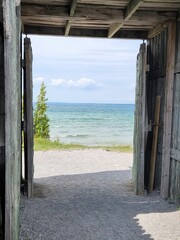 Fototapeta premium View of the lake from the old open doors of Fort Michilimackinac in Mackinaw, Michigan.