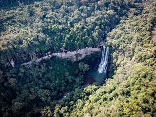Fototapeta na wymiar Drone shot of Salto do Zinco Waterfall in the middle of a forest in Santa Catarina, Brazil