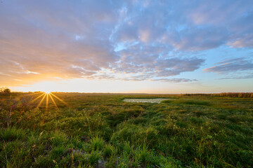 Sunrise over a wetlands