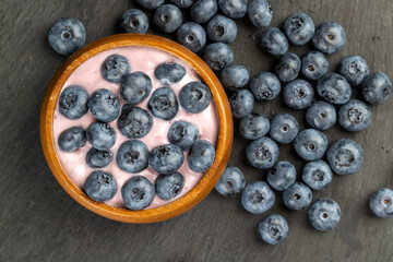 fresh blueberry-flavored yogurt with ripe blueberries