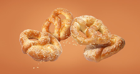 Tasty pretzels on beige background