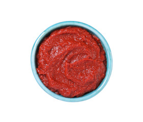 Bowl of tasty tomato paste isolated on white, top view