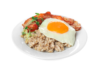 Tasty boiled oatmeal with fried egg, bacon and tomato isolated on white