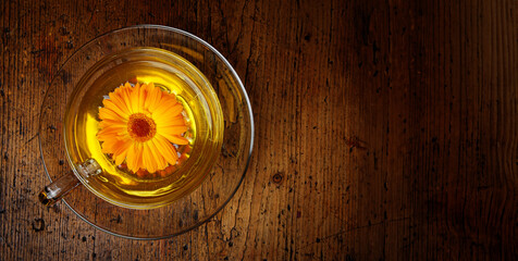 marigold tea on a wooden table