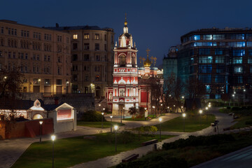 View of the Church of St. George on the Pskov Hill and Zaryadye Park under night lighting, Moscow, Russia