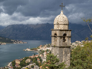 View of the fortified town of Kotor from San Giovanni Castle, with the Church of Our Lady of Remedy in the foreground, Bay of Kotor, Adriatic Coast, Montenegro