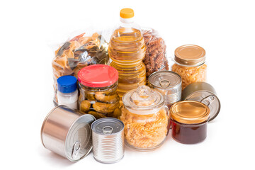 Food Reserves: Canned Food, Spaghetti, Pate, Tuna, Tomato Juice, Pasta, Fish and Grocery - Isolated on White Background. Emergency Food Storage in Case of Crisis. Strategic Food Supplies - Isolation
