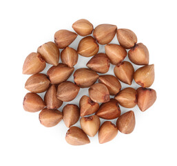 Many dry buckwheat grains isolated on white, top view