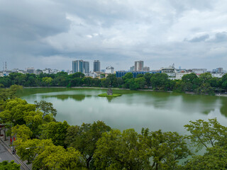 Aerial skyline view of Hoan Kiem lake ( Sword, Ho Guom lake), in center of Hanoi, Vietnam