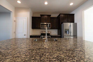 Kitchen with stainless steel appliances and granite counter tops. Investment, renting, or house...