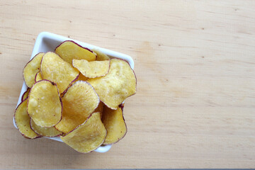 A healthy snack, sweet potato chips.