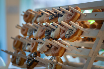 Pastries hanging from a shelf in a buffet restaurant