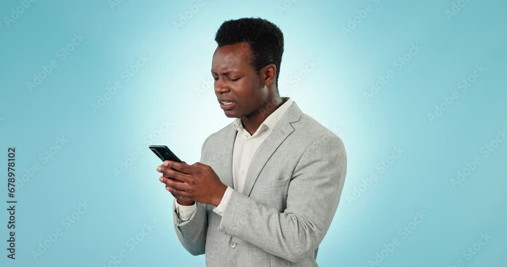Poster Angry, black man and phone text with spam, phishing and digital fail and professional frustrated in studio. Mobile scam, employee with error app with glitch and internet problem with blue background