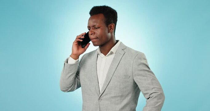 Businessman, phone and sad communication in studio for networking, discussion or conversation on blue background. Mobile, person and talking on smartphone for career chat, planning and assertive