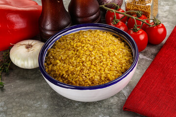 Dry wheat bulgur cereal heap