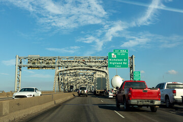 cars crossing the Mississippi at Baton Rouge at the old historic Horace Wilkinson bridge in Baton...