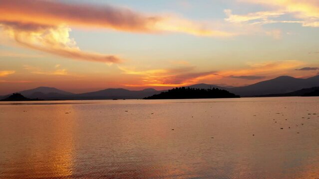 PATZCUARO LAKE AT SUNSET DRONE SHOT