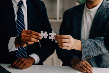 Construction and structure concept of engineer working drawing on blueprint meeting for project working with partner on model building and engineering tools in working site, construction concept.