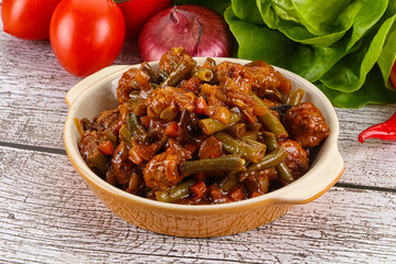 Meatball with vegetables and spices
