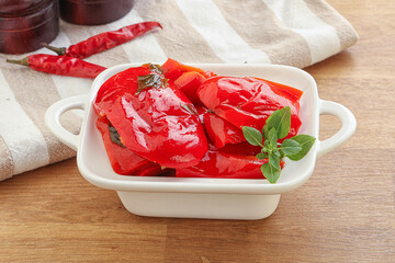 Marinated red bell pepper with oil