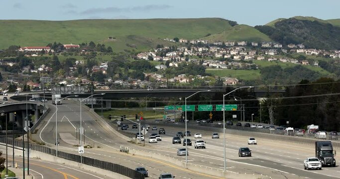 Dublin, California, USA - April 16, 2023: Springtime view of the 580 Interstate Freeway as it transverses through downtown Dublin.
