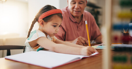 Grandfather, little girl and writing in book for learning, literature or education together on desk...