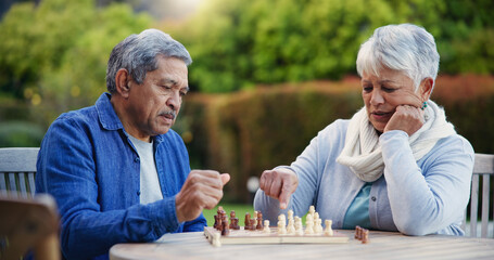 Senior couple, chess game or thinking of strategy, plan or mental health for brain power at home....