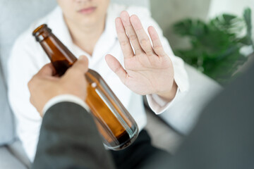 man refuses say no and avoid to drink an alcohol , hand show reject and stopping, alcoholism...