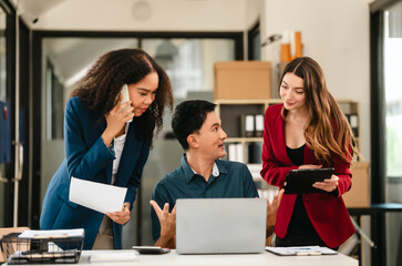 Professional team of caucasian and african american business women and asian man working together, papers, laptop, in office, Invoice, Job order cost system, Investing activities, interest expenses