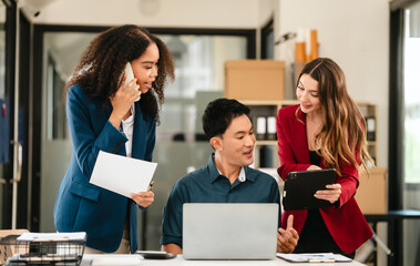 Professional team of caucasian and african american business women and asian man working together, papers, laptop, in office, Invoice, Job order cost system, Investing activities, interest expenses