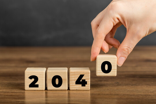 2040 on Wooden Block. Merry Christmas and Happy New Year, 2040 new year idea concept. Going in toward 2040
