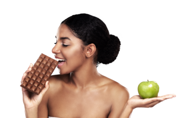 Woman, chocolate and apple as decision or diet choice, isolated on transparent png background. Indian person, candy and fruit or discipline health balance as sugar craving, lose weight or sweet snack