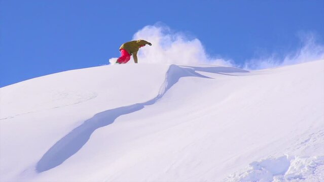 Cinematic Ikon Epic pass Colorado cold smoke below freezing snowboarder powder fresh snow turns butter slash air early frozen morning stunning beautiful blue sky super slow motion follow pan movement