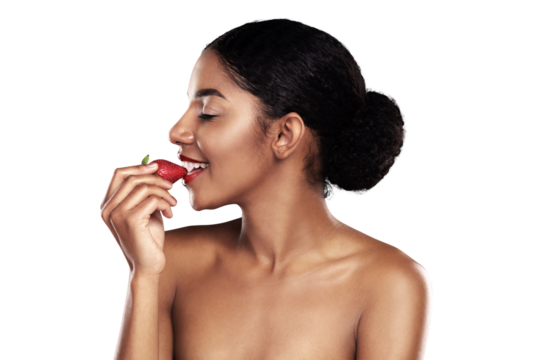 Beauty, smile or woman and eating strawberry isolated on png transparent background for health and wellness. Black person, smile and makeup with fruit for nutrition, healthy diet or organic detox
