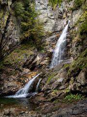 Obraz premium Waterfall in the Maria Valley ( Valea Mariii ) gorge, Hunedoara county, Romania
