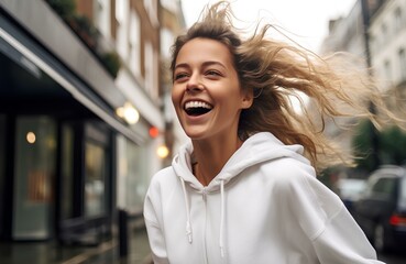 woman is in a white hoodie moving and smile, movement and spontaneity, london street background. generative AI - obrazy, fototapety, plakaty