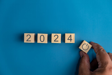 Starting new year 2024. wooden cube blocks. Beginning and start of the new year 2024. Preparation...